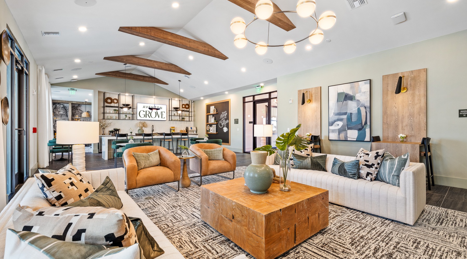 Luxury Apartments Near Walt Disney World – Aventon Grove – Club Lounge With TVs, Pool Views, And Community-Wide Wi-Fi.